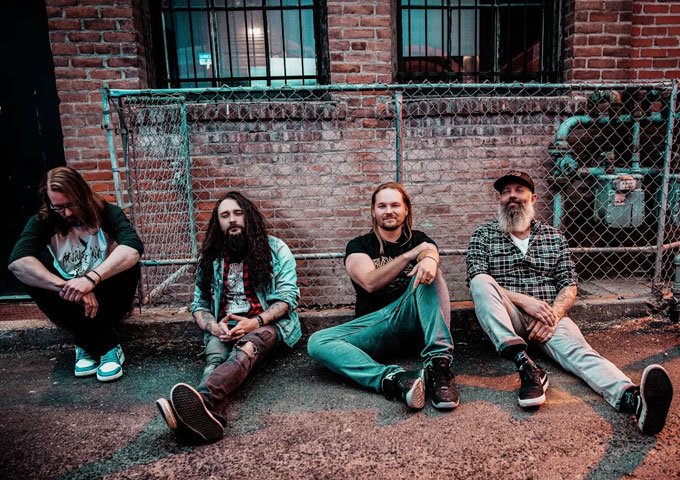 Stranded By Choice – ‘Marooned In Stone’: A Riff-Heavy Journey Through Time and Consciousness